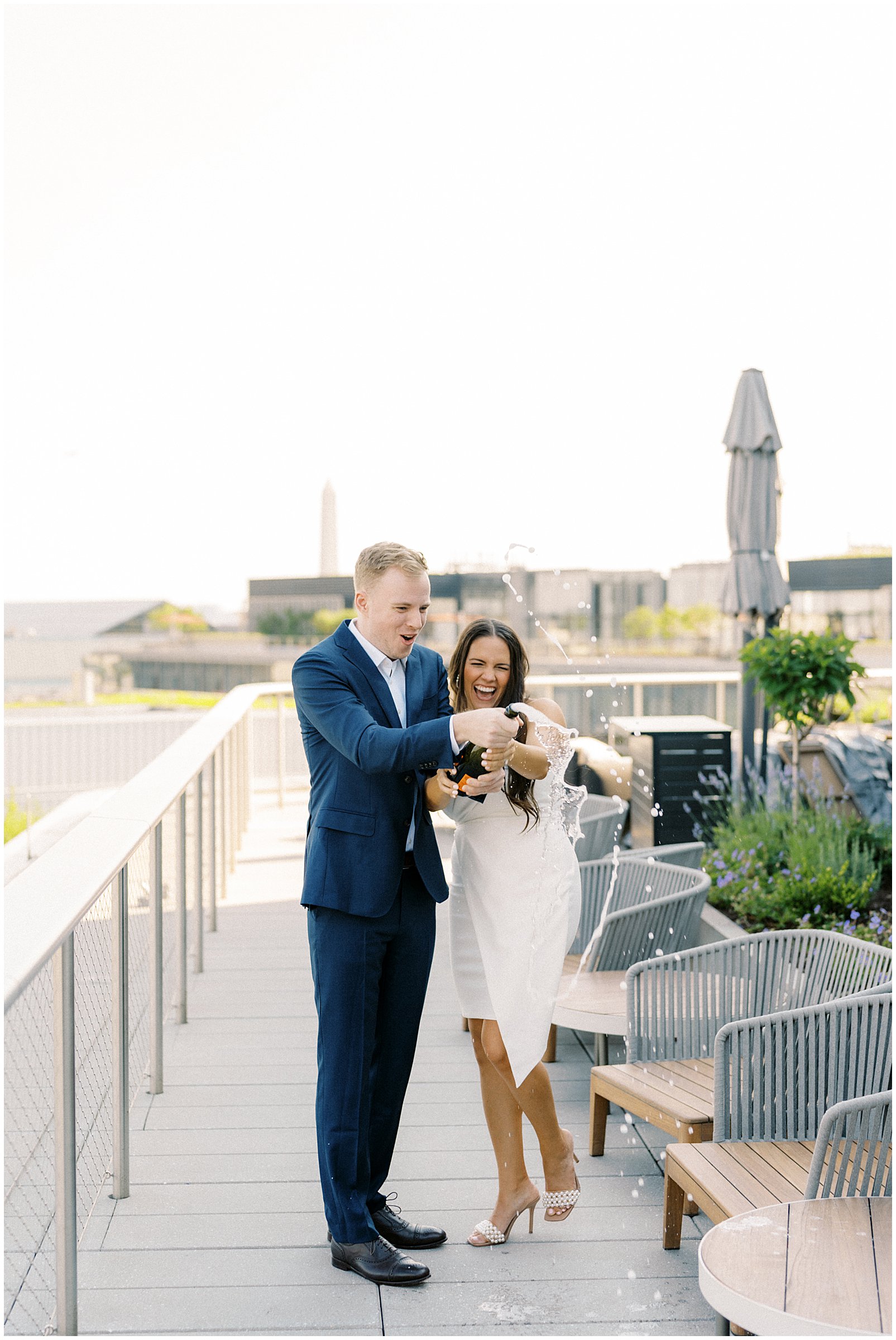 Rooftop engagement photos at the Conrad Hotel in Washington, DC