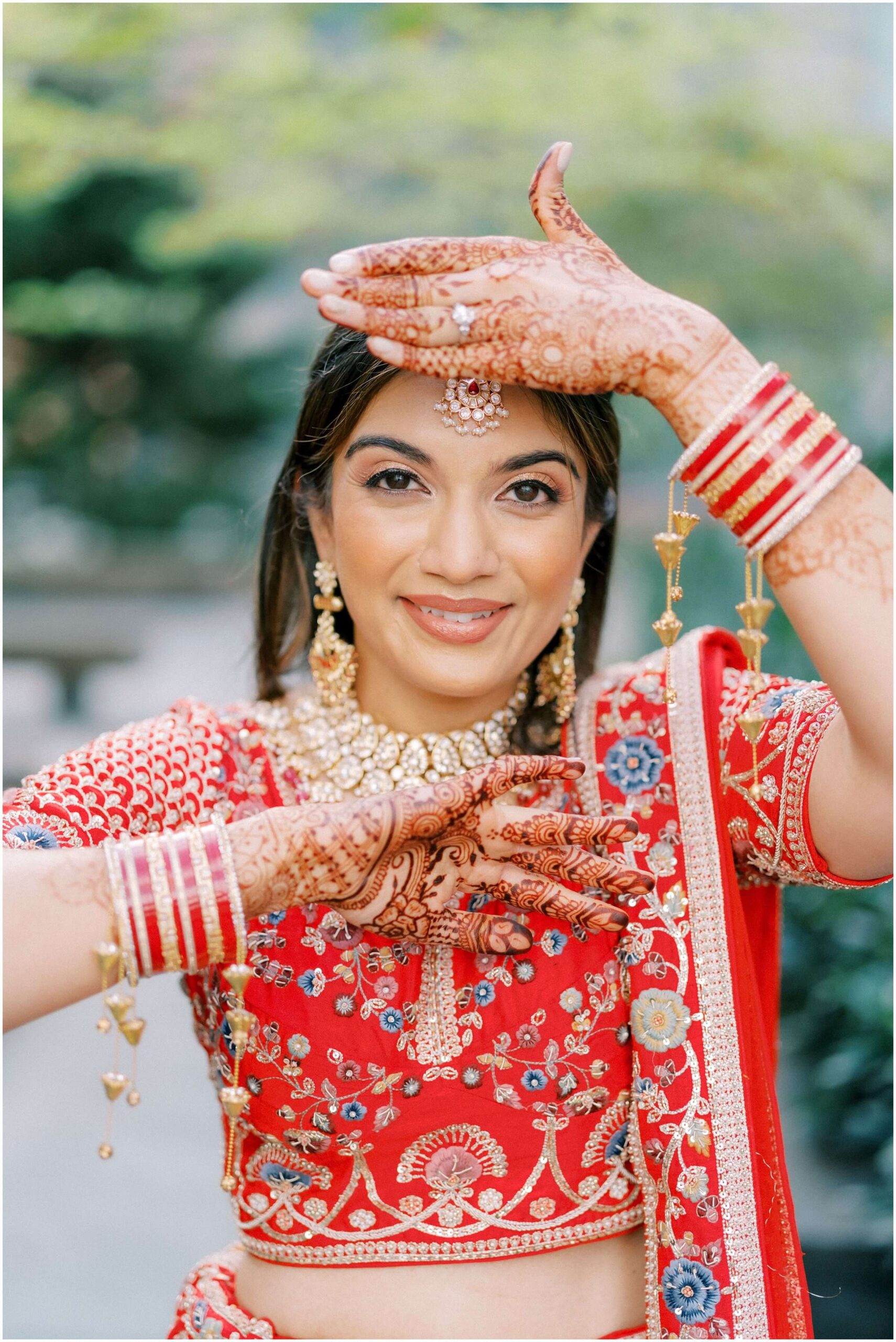 Bride in Indian wedding attire. Photographed by fusion wedding photographer Winnie Dora Photography.